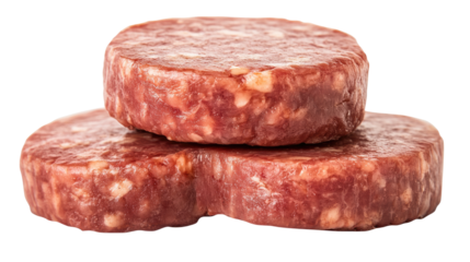 Three raw hamburger patties stacked together with fresh ground beef texture isolated on white background
