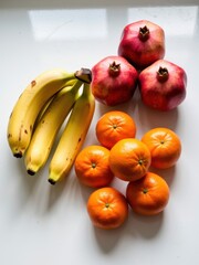 Fresh fruits arrangement kitchen counter food photography indoor top view healthy eating concept