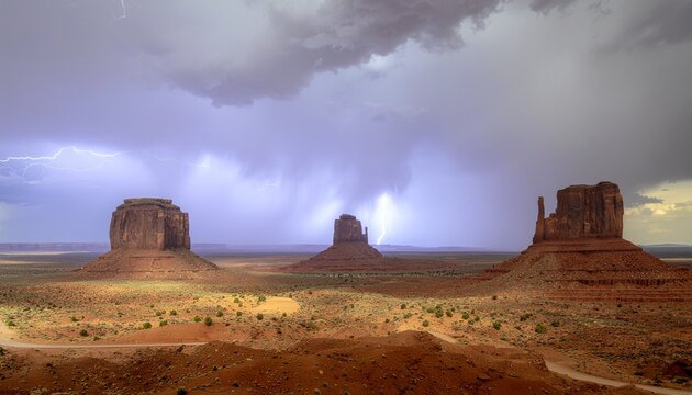 Desert Monoliths Under Storm - Powered by Adobe