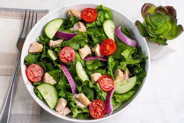 chicken salad with lettuce and tomatoes