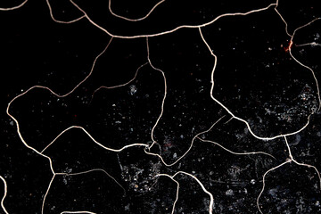 Cracked surface abstract background black and white