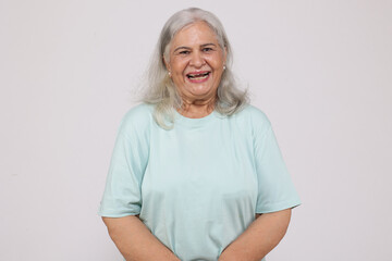Happy old woman portraits. Beautiful picture of indian  gracious senior woman grandmother in light...