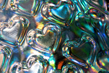 Abstract holographic velentines love hearts shiny background