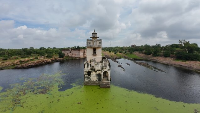 The Serene Rani Padmini Mahal: A Queen's Palace Reflected in a Pond, Chittorgarh Fort, Rajasthan, India 