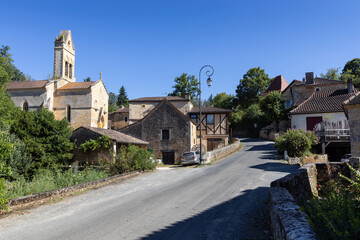 Summer view of the quaint village of Saint-Marcel-du-Perigord, in the Dordogne region of Southern France. Copy space above and below.