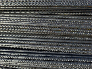 Stacked Steel Rebars in Closeup Showing Texture and Construction Material