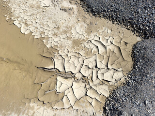 Parched Cracked Earth Surface in a Dry Lakeshore Landscape