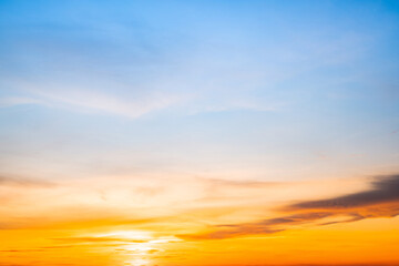 Beautiful , luxury soft gradient orange gold clouds and sunlight on the blue sky perfect for the background, take in evening,Twilight, Large size, high definition landscape photo