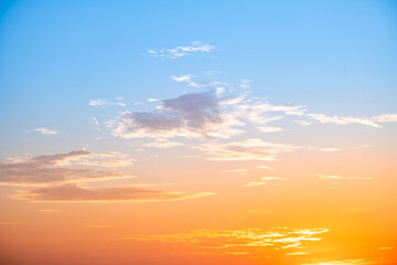 Beautiful , luxury soft gradient orange gold clouds and sunlight on the blue sky perfect for the background, take in evening,Twilight, Large size, high definition landscape photo