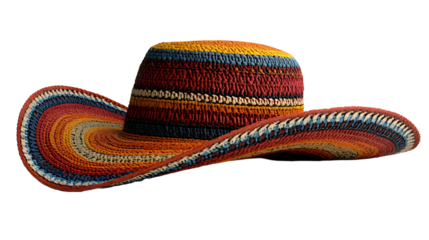 A straw Mexican sombrero hat with colorful stitching is isolated on a white background