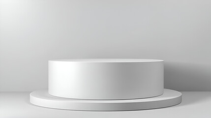 White cylindrical pedestal on a circular base against a plain white backdrop