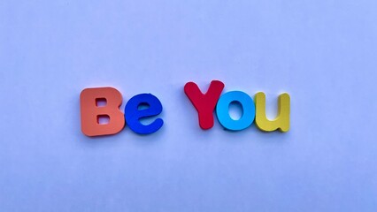 Be You: A Simple and Empowering Message on White Background
