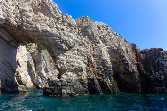Natural Stone Arch Over Seawater Along the Coastal Cliffs. Zakynthos - Greece
