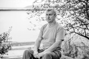Pensive European senior man, emotional portrait of reflection and life challenges. Emotive portrait...