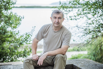 Pensive European senior man, emotional portrait of reflection and life challenges. Emotive portrait...