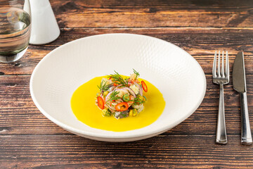 Fresh ceviche with citrus olive oil and colorful garnish