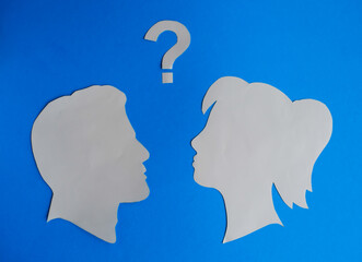 Question Mark Between Male and Female Silhouettes