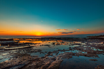 Naklejka premium sunset over the sea