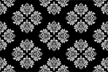 White floral pattern on black background, seamless, designed for fabric, wallpaper, clothing, background, decoration, tiles.
