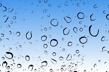 A macro-style shot of numerous water droplets on a glass surface, with a blue sky visible in the...