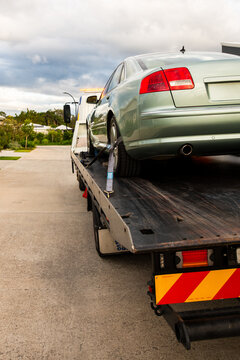 car being put on a tow truck