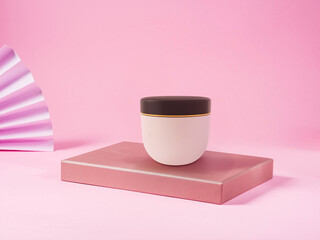 Make up foundation bottle and application brush on pink