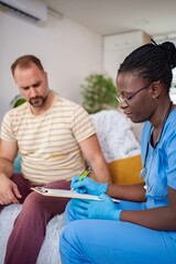 Health consultation with caregiver in a cozy living room