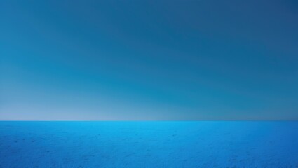 Obraz premium A vast blue ocean and sky under a clear sky.