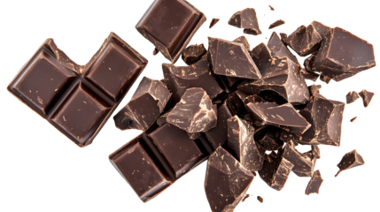A close up shot of a pile of dark chocolate chunks and a chocolate bar on a black background