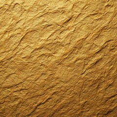Golden handmade paper with rich crumpled texture, creased shimmering surface, intricate patterns, perfect for creating luxurious festive backgrounds, refined seasonal decorative designs. Closeup.