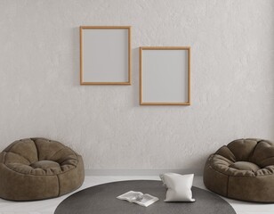 Two framed prints on a light beige wall, with brown beanbag chairs, a gray rug, and a white pillow