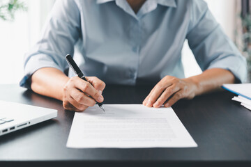 Business person with contract law and paper work for business finance, loan application form,...