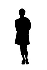 front view full length portrait of a woman in skirt, striped sweater and sneakers with arms on back on white background