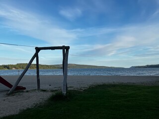 empty swing on the beach
