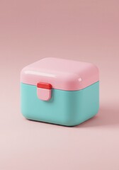 Close up of a pastel pink and blue baby formula container for travel on a pink background