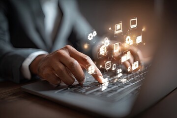 Businessperson using laptop with digital icons