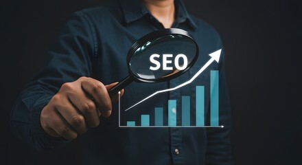 A man is holding a magnifying glass over a graph that shows the growth of SEO. Concept of the importance of SEO in today's digital world and the need to constantly monitor and improve it