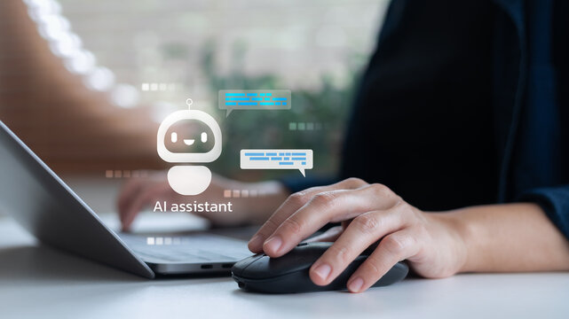 User working on a laptop with an AI assistant chatbot icon and conversation bubbles, representing virtual customer support, automation, and artificial intelligence technology.