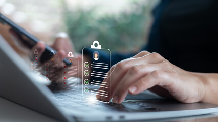 An HR professional is using a laptop to review digital candidate profiles with checklist icons,...