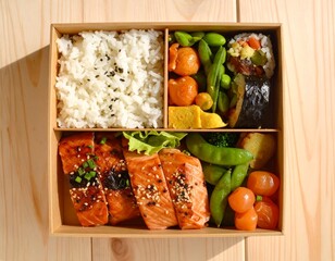 An overhead view of a traditional Japanese bento box meal with grilled salmon, rice, and colorful assorted vegetables and sushi on a wooden table.