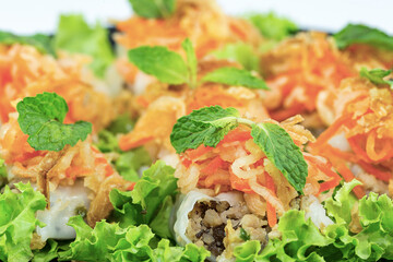 Vietnamese steamed rice-skin dumplings with pork filling, fried garlic.