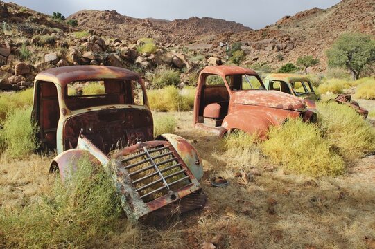 Scrap vehicles near the Namtib Lodge in the Tiras mountains, Namibia, Africa