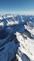  Breathtaking Aerial View of a Snow-Covered Mountain Range.For design, print, wallpaper, poster, interior, advertising, banner.