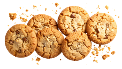 Delicious chocolate chip cookies breaking apart with crumbs scattered isolated on transparent background