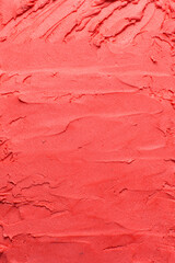 Top view of red buttercream for decorating cake, silky smooth american buttercream with patterns, overhead view of smooth red buttercream