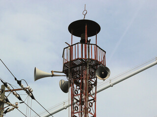 A closeup image of the loudspeakers attached at the top of the steel warning tower.
This type of...