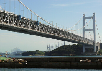 The Seto Ohashi Bridge is a series of interconnected spans that appear to wind across the islands...