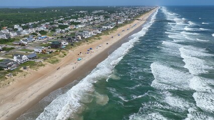 Outer Banks, NC Kill Devil Hills beach houses and real estate on coastline popular summer vacation destination for relaxing by the beach