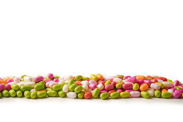 Sweet multicolored candies isolated on white background.