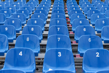 Identical blue seats at the stadium